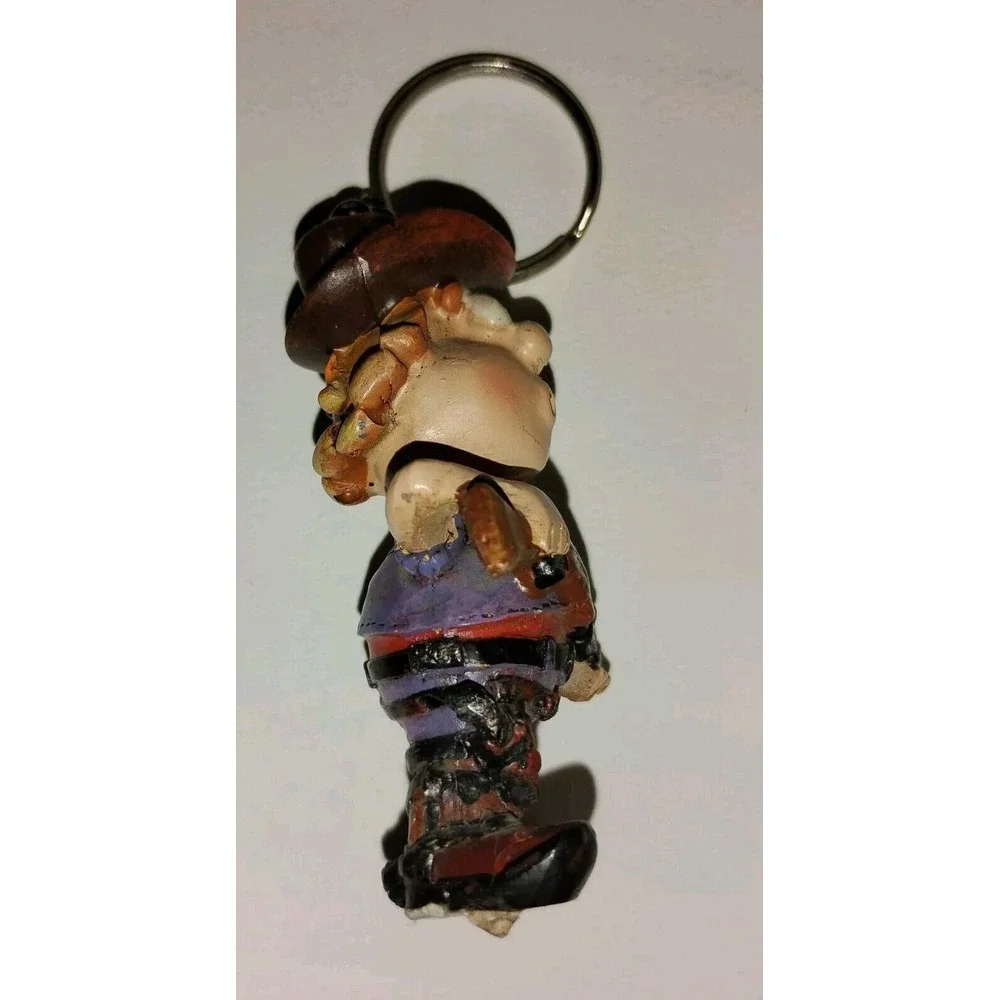 Crazy‎ Crosseyed Cowboy Keychain Figure Possible Vintage Carrying Shotgun Scar
